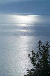 Early morning sun over cuttlefish cove,
Devon. 60mm. by Derek Haslam 